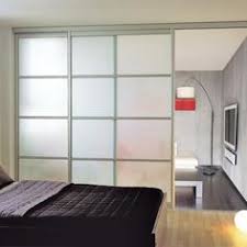 Des Portes Coulissantes Pour Agrandir Et Decorer Votre Interieur Cloison Coulissante Cloison Porte Coulissante