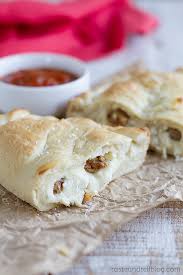 Distribute the ham, salami, and half the pecorino over. Ricotta Calzones With Sausage Taste And Tell