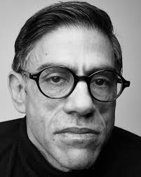 Davis begins each work through a contemplative and methodical process. He  cuts a small piece of canvas into a rectangle or square, draws a grid  across the surface, and applies a layer