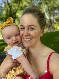 Pauline was delighted to snap this photo with her gorgeous baby girl. But  it also caught the first sign something was seriously wrong with the new  mum's health: 'It was off' |