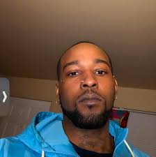 Is the cat playing with the curtain?