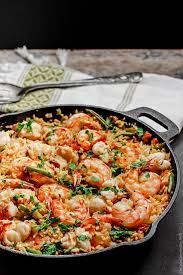 Easy Seafood Paella Recipe The Mediterranean Dish Paella Recipe Seafood Paella Recipe Easy Paella Recipe Seafood