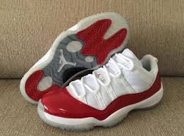 Jordan 11 Red Black And White Low Top New Images Have Surfaced For The Air Thesolesupplier Co Uk Air Jordan 11 Low Sneakers Men Fashion Air Jordans