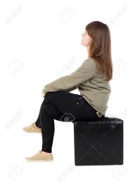 This is the normal crossed leg position used by most european and asian cultures. Back View Of Young Beautiful Woman Sitting Girl Watching Stock Photo Picture And Royalty Free Image Image 51617235