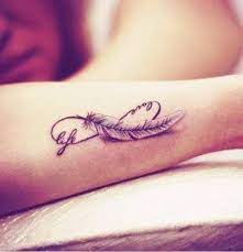 Our next tattoo has an emotional phrase. Love Life Feather Infinity Infinity Tattoo Tattoos Feder Tatowierungen