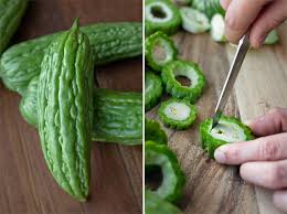Scoop out the seeds with a spoon. A Soup Of Stuffed Bitter Gourd And Pickled Mustard Greens Born Hungry