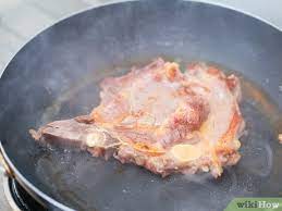 Place seasoned meat in an uncovered roasting pan on a shelf in the bottom 1/3 of your oven. 3 Ways To Tenderize Pork Wikihow