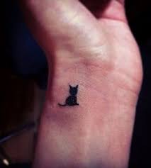 Pin By Colleen Mcculloch On Hair Tat Random Neck Tattoo Tiny Cat Tattoo Cat Tattoo Designs