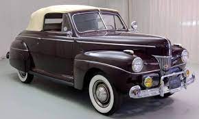 1941 1942 Ford Pictured A 1941 Ford Super Deluxe Convertible The Last Of Henry S Fords A Much Modern Looking Cars With A W Car Ford Retro Cars Classic Cars