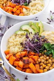 The tangy glazed sweet potatoes are served with turmeric infused grains, grilled portobello mushroom, charred onion, and snow peas then topped off with avocado and hemp seeds. Sweet Potato Quinoa Bowls Cooking For My Soul