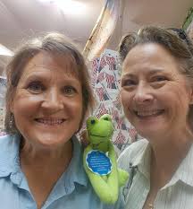 Alicia and Dennis (Guinn Quilting and Weaving) are putting the finishing  touches