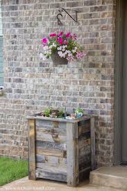 Fairytale house with a balcony with flowers. 10 Tall Planter Box Plans For Diy Vertical Trapezoid 100 Free Wood Planter Box Wood Planters Tall Planter Boxes