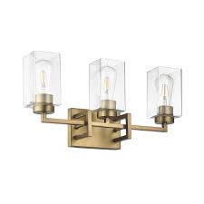 It features a rectangular metal backplate with a variety of neutral mirrored finishes to choose from, and angular, swooping arms. 3 Light Antique Brass Vanity Light Overstock 32727923