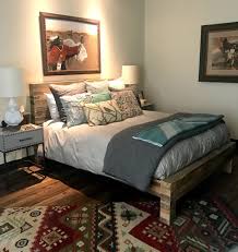 A sliding glass door leads out to a patio. Decorating A Mountain Modern Guest Bedroom Our Colorado Home Sheshe Show By Sheree Frede