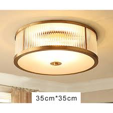 A fitting piece for providing overhead lighting in a bathroom, living room or bedroom in any coastal or modern farmhouse interior. Drum Shade Ceiling Light Brass Flush Mount Glass Modern Fixture