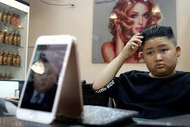 North korea has not confirmed any. Kim Jong Un Hairstyle Kim Jong Un S Unique Do Or Tan Locks Like Donald Trump Hanoi Barber Offers Free Haircuts The Economic Times