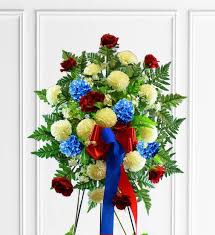 Maybe you would like to learn more about one of these? Red White Blue Sympathy Spray Avas Flowers