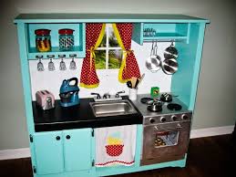 25 Recycled Upcycled Entertainment Centers Furniture Projects Diy Play Kitchen Kids Play Kitchen Childrens Kitchens