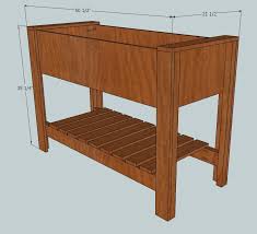 The design plans and materials list are shown below. Raised Planter Box With Bottom Shelf Ana White