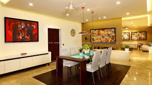 Dining Room Interior With Glass Top Dining Table And Beautiful Wall Mount Paintings Designed An Dining Room Interiors House Interior Interior Design Companies