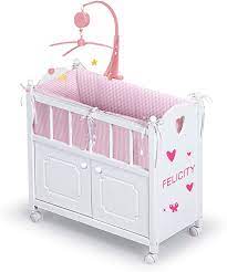 Amazon Com Badger Basket Cabinet Doll Crib With Gingham Bedding Musical Mobile Wheels And Free Personalization Kit Fits American Girl Dolls White Gingham 01721 Toys Games