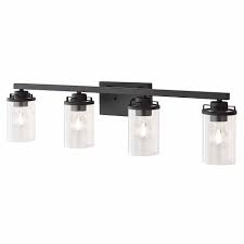 Lighting is an often overlooked but key component of a home's style. Home Decorators Collection 8 25 Inch 4 Light Black Finish Vanity Light Fixture With Clear The Home Depot Canada