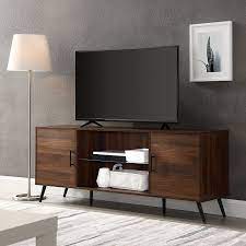 This media console is equipped with a roomy cabinet and open compartments to display (or hide away) books, electronics and more. Amazon Com Walker Edison Englewood Mid Century Modern Glass Shelf Tv Stand For Tvs Up To 65 Inches 60 Inch Walnut Furniture Decor