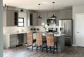 Instead of requiring a completely different room, the studio design incorporates a euro laundry, complete with room for. Open Kitchen Design With Studio Gray Cabinets Island Cliqstudios