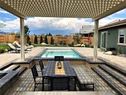Imagine your family playing safely in the comfort of your yard. 4 Ideas For Incorporating A Pergola Into Pool Designs In Las Vegas Nv Firesky Outdoor Designed By Landscape Architects Built By Craftsmen