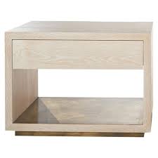 Brass accents meet a natural solid wood grain for a retro look that's sure to bring your bedroom to a new level. Bleached White Oak With Brass Shelf Cliffside Nightstand By Casey Mccafferty For Sale At 1stdibs