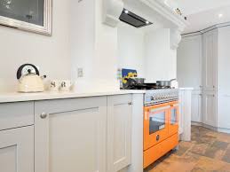 Shaker kitchens have been popular for many reasons, and for a good reason. Light Grey Shaker Kitchen With A Dark Grey Kitchen Island Klassisch Modern Kuche Essex Von Broadway Bespoke Kitchens Houzz