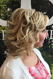 20 glamorous curly hairstyles for women over 40 1. Sassy Hairstyles For Women Over 40 Lovehairstyles Com