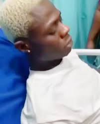 With the presence of heavy security, Nurse Feyi that injected Mohbad has  arrived The Coroner court with a mask