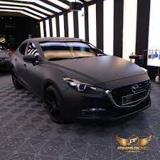 Matte materials do not reflect as much light, whether they are black, red, blue or even white, meaning the light disperses across the bodywork surface and creates softer highlights. Mazda 3 Full Wrap Matte Black Dreams Factory Automotive Facebook