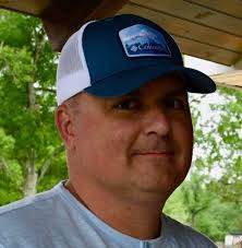 We had a tree split in our back yard and now my kids can't play back there.  Is there anyone willing to just come cut it up for us? We can move