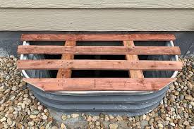 A window well cover is a sheet of material manufactured to fit over the top of an exposed window well to cover the well and basement window. Diy Window Well Cover 5 Steps To Make Them With Pictures