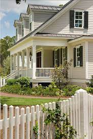 Ten colorful paint colors that act like neutral paint colors. Picket Fence Gardens With Picket Fence Picketfence Curbappeal Farmhouse Exterior Coastal Farmhouse Exterior Exterior House Colors
