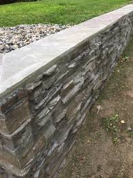This will help the wall resist the pressure of the backfill (ground soil behind the wall). Rock Retaining Wall Cheapest Way To Build A Retaining Wall Genstone
