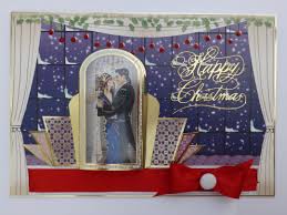An 8x8 quick card with a banner and three blank groups of swirls that you can add greetings and names to, an 8x8 topper, a coordinated 8x8 insert, an 8x8 card base, two 7x7 backers: A4 Hunkydory Art Deco Crafting By Name