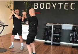 Personal Trainer Byron Training A Client At Our Bodytec Bryanston Studio Studio Bryanston Fitness Emstraining Fit Personal Trainer Hiit Personal Trainers