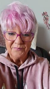 I'm nicola I'm 50 and just had my hair cut after 6 weeks ,love a fresh  cut.i don't dye my hair I like my gray.