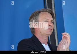 London, UK. LIBRARY. Record producer Giles Martin (son of George Martin) at  The London Stands with Ukraine March in support of the country after it was  invaded by Russia in February 2022.
