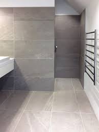 Whether you are sold on lvt or another type of tiled hard flooring or carpet, always many people make the misstep of choosing tiny tiles in their intimately sized rooms, which only emphasizes how small the space is. Using Large Format Tiles In Small Spaces Large Format Tile Bathroom Decor Small Spaces