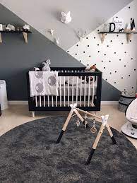 This sweet nursery designed for emmie perfectly pairs feminine and classic design for a sophisticated room that both daughter and mother love. Monochrome Zoo Nursery Project Nursery Baby Room Colors Nursery Baby Room Baby Room Decor