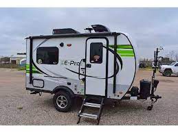8 Best Small Campers Under 2 000 Lbs With Bathrooms Small Camping Trailer Small Campers Tiny Camper Trailer