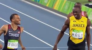 Hey, usain is this fast enough for you? (ap photo/david j. Usain Bolt Symbolically Passes The Torch To Andre De Grasse Athletics Illustrated