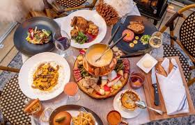 Photo about an outdoor patio at a restaurant is decorated with a tropical decor. Best Outdoor Dining In Nyc During Covid 19