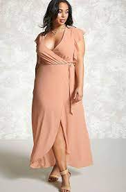 What To Wear To A Beach Wedding Beach Wedding Attire Theknot Com Plus Size Wedding Guest Outfits Dresses For Apple Shape Plus Size Wedding Guest Dresses