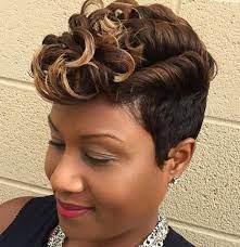 For dramatic touch, a deep side part sweeps a strip of highlights over the forehead. 150 Stylish Short Hairstyles For Black Women To Try