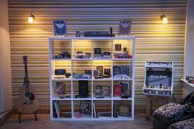 Wood, fabric, lack shelves description: Retro Gaming Wall Nice Game Display Shelves Via Reddit User Jamieoliver22 Video Game Rooms Game Room Game Room Design